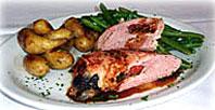 Steal This Recipe� Pork Tenderloin Stuffed with Spinach, Fontina Cheese, Sun Dried Tomatoes with a Red Wine Reduction