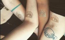 Grocery store offers discounts for customers who get logo tattoos